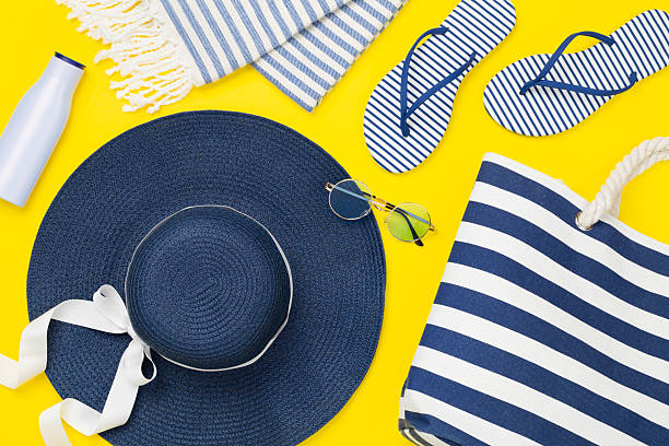 istock Blue beach accessories on color background, top view. Flat lay 2217370324