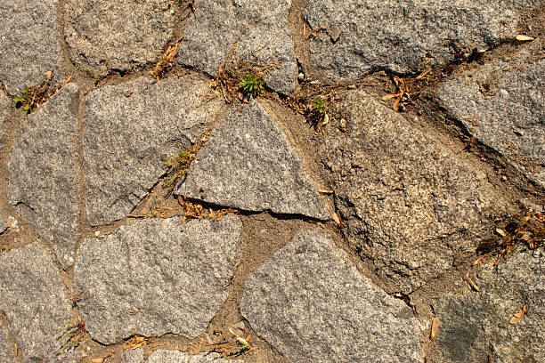 istock Stone cubes with concrete on the ground. Flat lay 2217372108