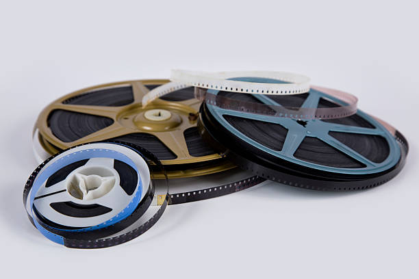 Eight Millimeter movie reels, retro film reels on white background.