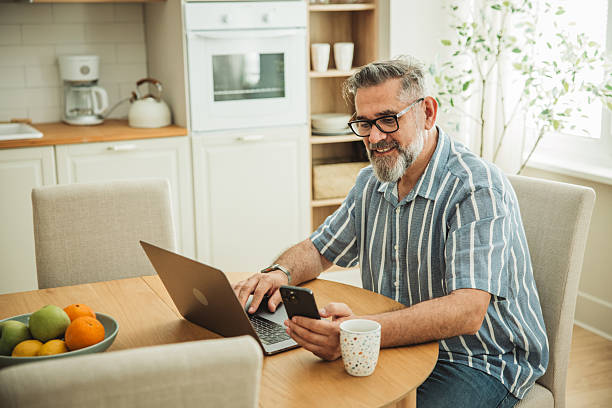 istock Mature man working from home 2217374558