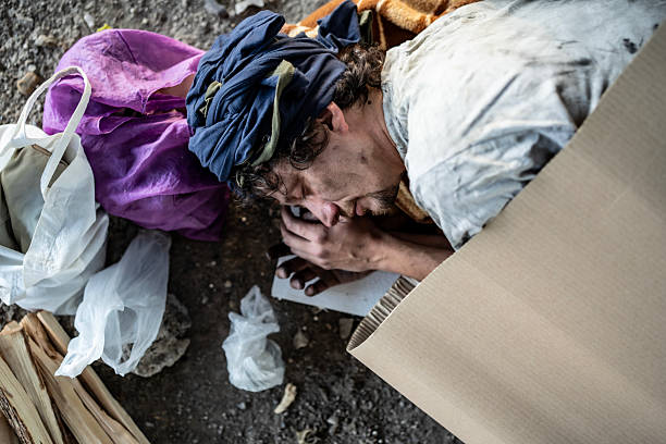 Bogota, Colombia - May 01, 2016: A homeless man sleeping on the street Bogota, La Candelaria, South America