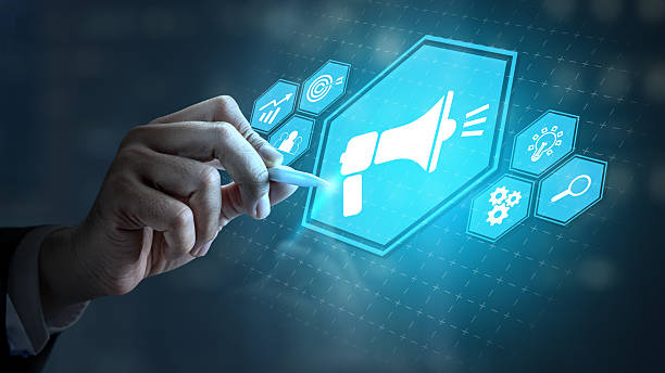 istock Businessman touching the icon of a megaphone. Technology innovation on a virtual screen. Concept of public relations 2217379708