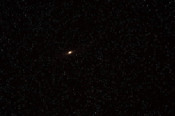 istock Andromeda galaxy moves across a starry dark sky 2217381687