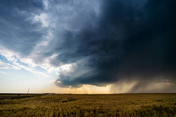 istock Threatening Storm Clouds Swirl Over a Quiet Forest Before Impact 2217383180