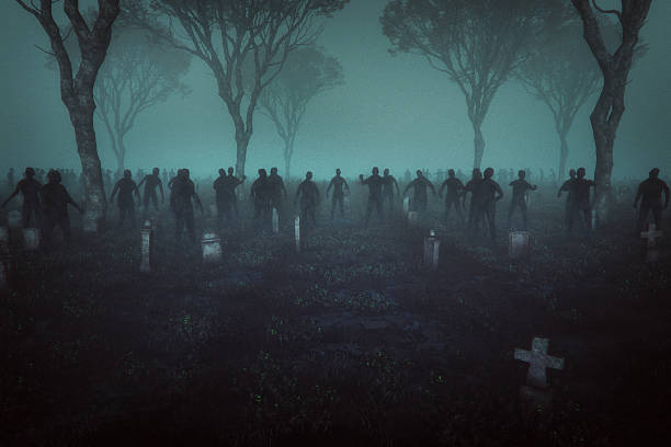 istock Zombies in the graveyard at night 2217391118