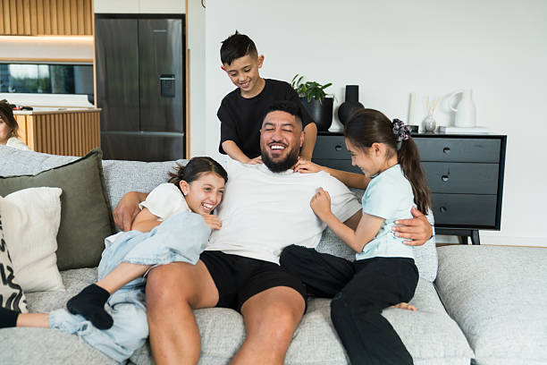 istock Father with children strengthening bonds through fun. 2217392750