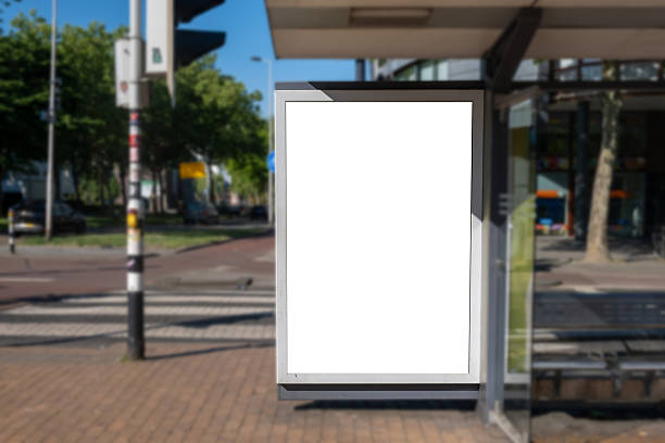 istock Blank advertise display stand, empty vertical billboard on a bus stop. Advertisement template in Netherlands 2217396013