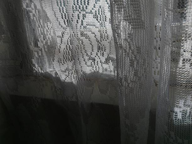 istock Curtain lace curtains for window and sunlight 2217399289