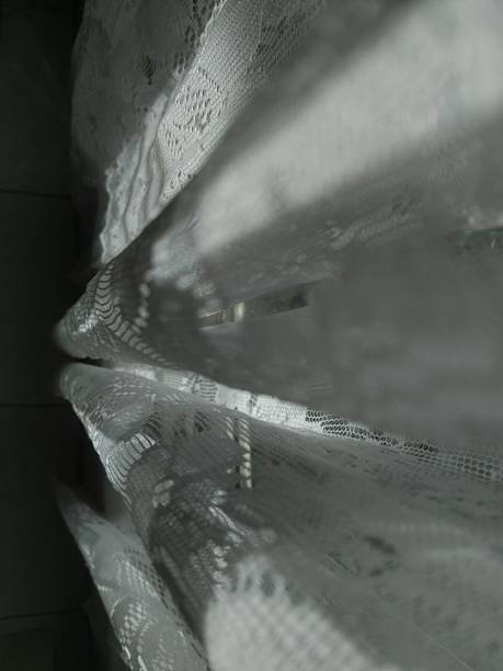 istock Curtain lace curtains for window and sunlight 2217399299