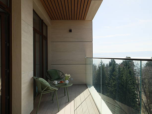 istock This modern balcony design features stunning scenic views alongside stylish and comfortable seating 2217401172