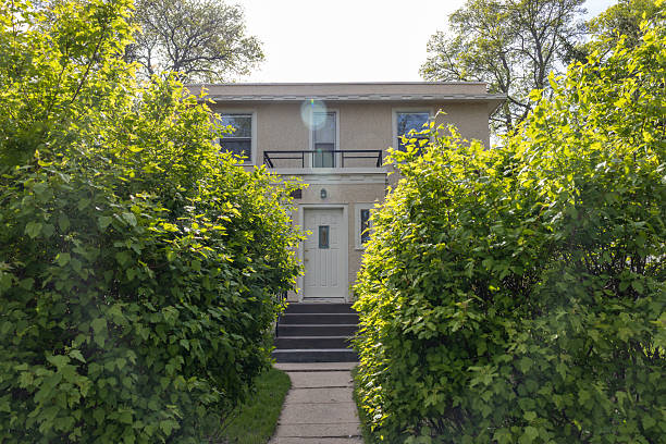 Hibbing, Minnesota, USA - May 21, 2025: Landscape view of the childhood home of musician Bob Dylan from 1948 to 1959, when he was known as Robert Zimmerman. The house is in the Mediterranean Modern architecture style.