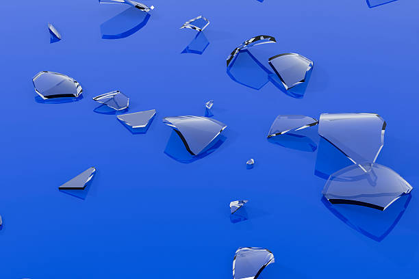 istock Broken glass scattered on a blue floor 2217401990