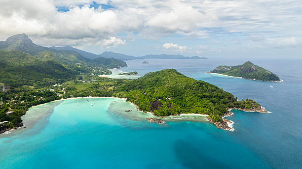 istock Clear blue sea with islands and cloudy sky. Seychelles. 2217403951