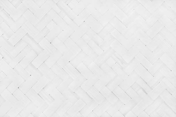 istock Old white bamboo weaving pattern, woven rattan mat texture for background and design art work. 2217410933