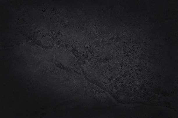 istock Dark grey black slate texture in natural pattern with high resolution for background and design art work. Black stone wall. 2217410977