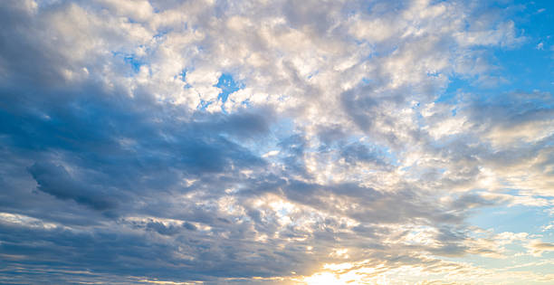 istock White clouds on blue sky. Beautiful sunny sky. Background with clouds on blue sky. Clouds on sky pattern. 2217413549