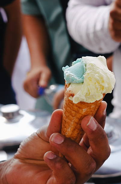 istock Ice Cream Cone Closeup Vibrant Handheld Dessert Summer Treat 2217415185