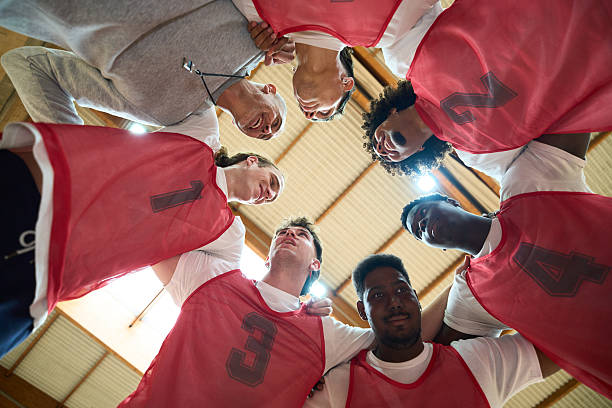 istock Basketball team and coach motivating before game 2217423101