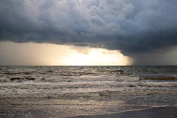 istock View of thunderstorm clouds above the sea 2217424228