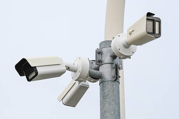 istock Surveillance cameras mounted on a pole for security monitoring. 2217427090