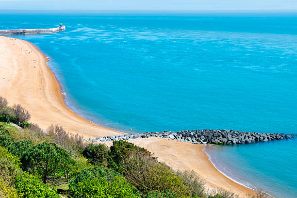 View of Folkestone Beach in Kent, England on a nice sunny spring day