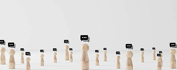 istock Concept of online communication or social networking wooden blocks with speech bubbles linked to each other with lines. 2217433369