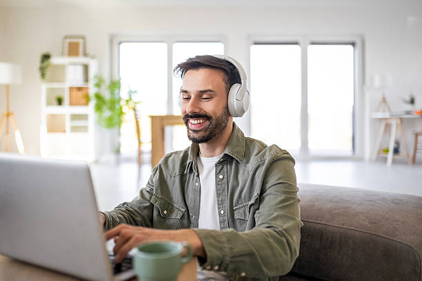istock Student Typing on Laptop at Home or in Dorm Room 2217434046