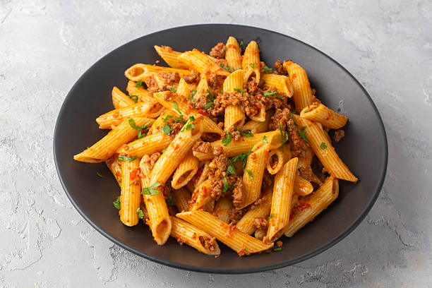 istock Penne pasta with minced meat looks delicious 2217434939