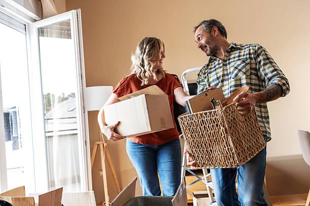 istock A married couple is moving into their new apartment. 2217442721