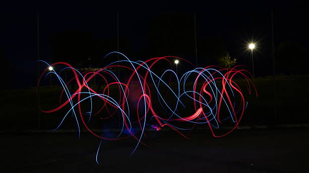 istock Dynamic Blue Light Trails in Urban Night Scene – Long Exposure Photography 2217444692