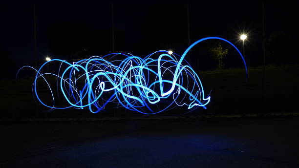 istock Dynamic Blue Light Trails in Urban Night Scene – Long Exposure Photography 2217444694