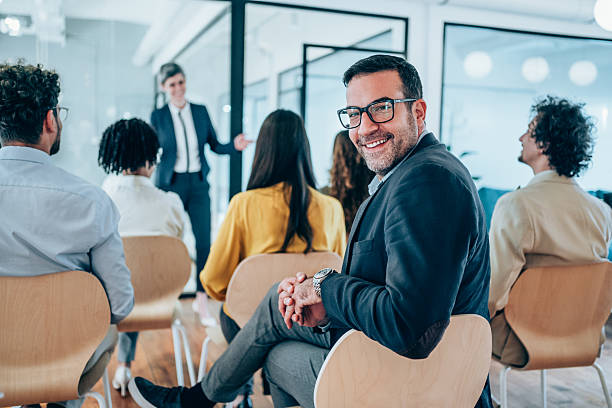 istock Confident businessman attending a seminar. 2217445123