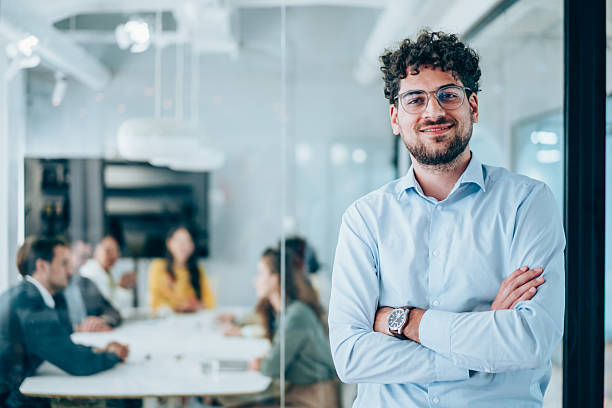 istock Confident businessman and his team. 2217445125