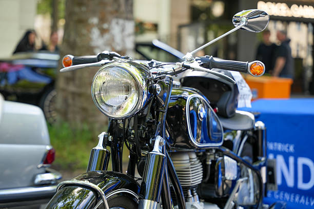 Germany Berlin May 11, 2025. Vintage BMW Motorcycle front view. Frontal close-up of a classic BMW motorcycle with a large headlight and gleaming chrome. An impressive two-wheeler from the golden era.