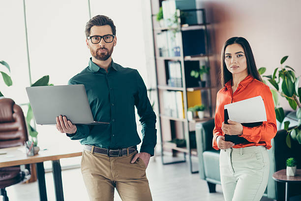 istock Professionals Collaborating in a Modern Workspace Highlighting Teamwork and Business Strategy for a Successful Project Outcome 2217451645