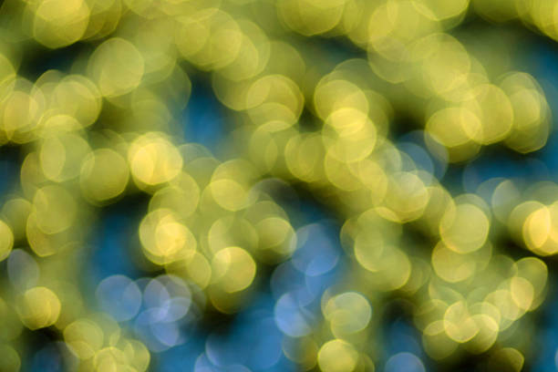 Blue and yellow blurred background for post card or presentation in festive happy New Year mood.