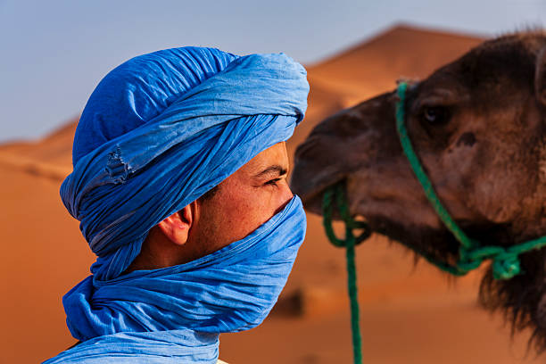 istock Young Tuareg with camel on Western Sahara Desert in Africa 2217455604