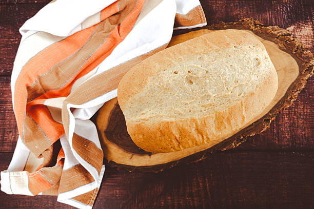 Homemade Sourdough Bread On Dark Wood