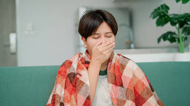 istock Asian woman having cold and flu 2217458850