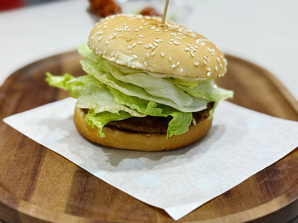 istock Hamburger with lettuce, cheese, tomato and mayonnaise 2217461028