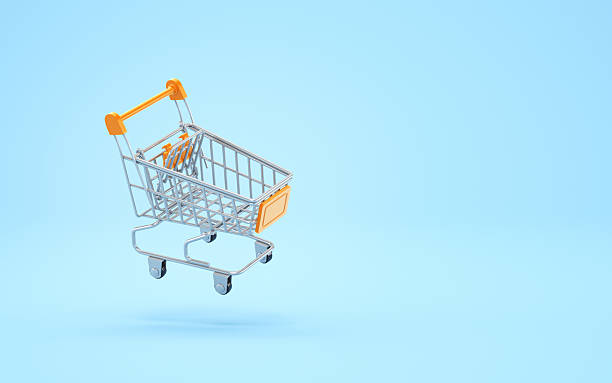 istock Empty Orange Plastic Colorful Metallic Shopping Cart on Soft Light Blue Endless Background 2217465667