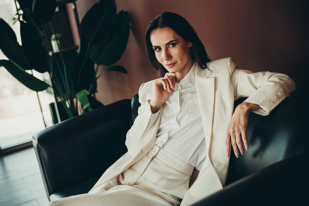 istock Successful female business professional in a modern office setting exuding confidence, style, and elegance in formal attire 2217467210