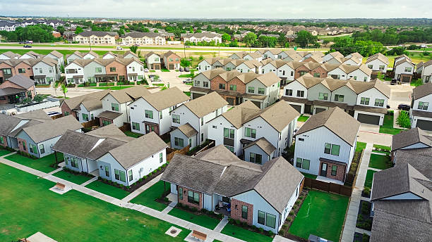 istock Huge apartment complex buildings along Texas State Highway 121, Sam Rayburn tollway near McKinney Medical District and new construction rental house community, well maintenance single-family home 2217477112