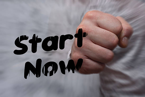 istock Clenched fist with Start Now Text, motivational message. Action concept and Urgency. 2217480289