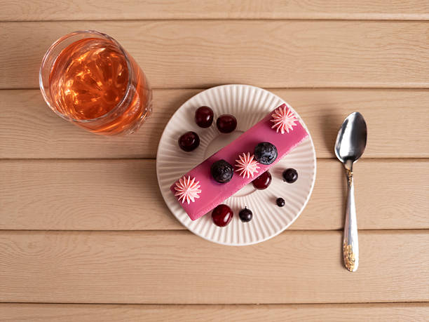 istock Pink Glazed Cake with Berries and Juice Flat Lay 2217480896