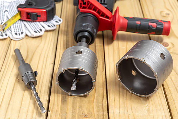 istock Crown drill bits for concrete on wooden table 2217485279