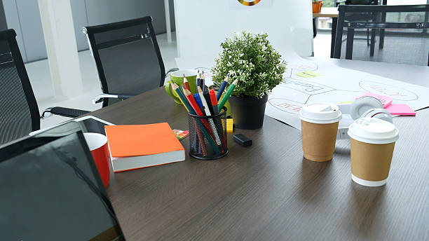 istock Office laptop business financial document chart and graph on wooden table with coffee cup. Flat lay notebook computer laptop office desk. No people business graph chart mockup on business workspace 2217487474