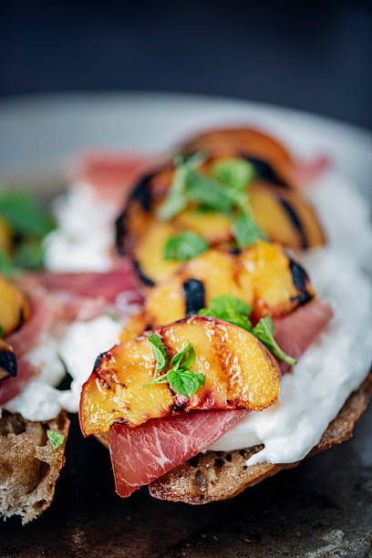istock Peaches with Buratta and Prosciutto 2217491451