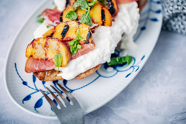istock Peaches with Buratta and Prosciutto 2217491474