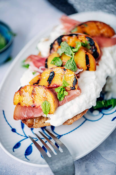 istock Peaches with Buratta and Prosciutto 2217491583